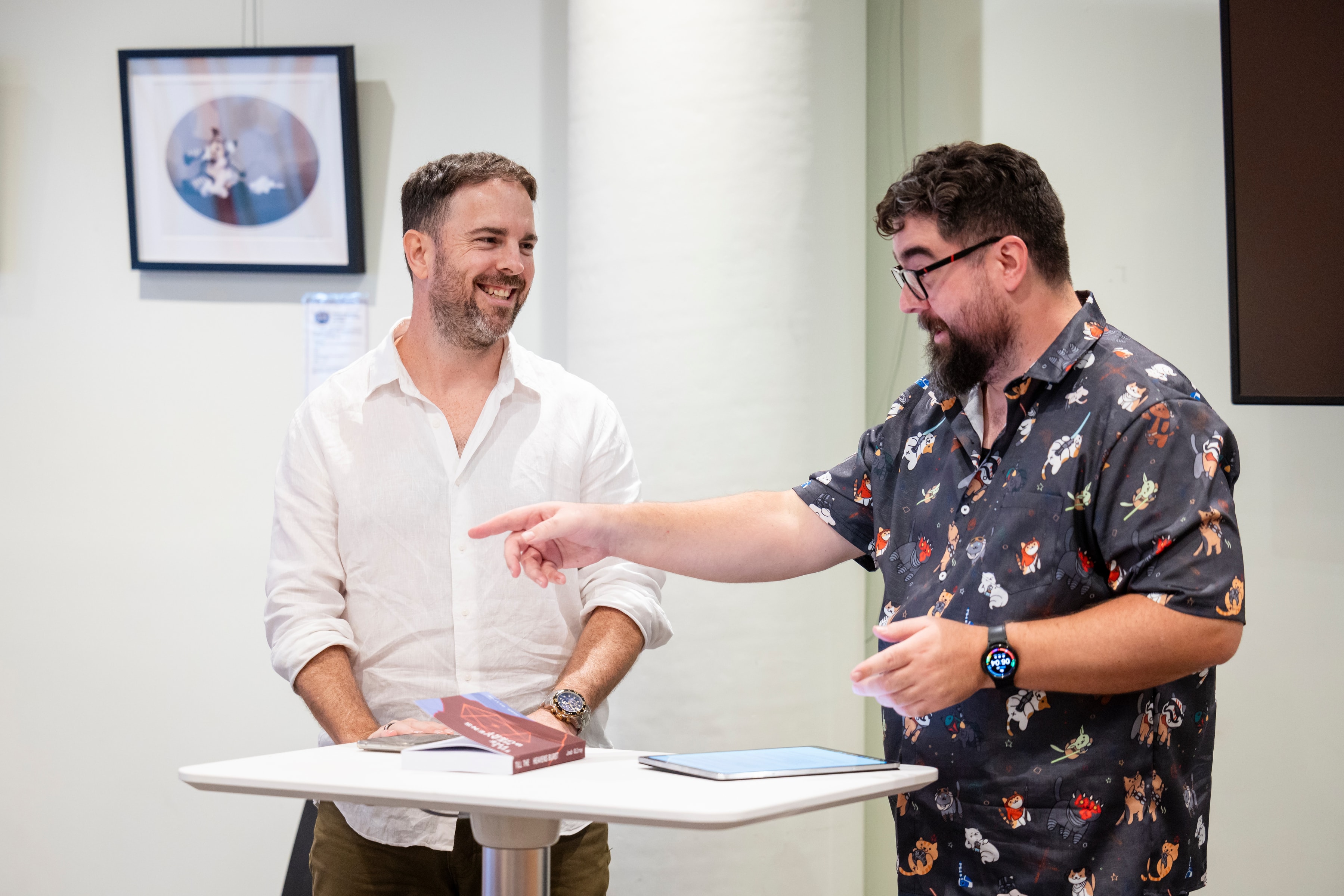 Nathan Lawrence gestures vigourously while Joab smiles