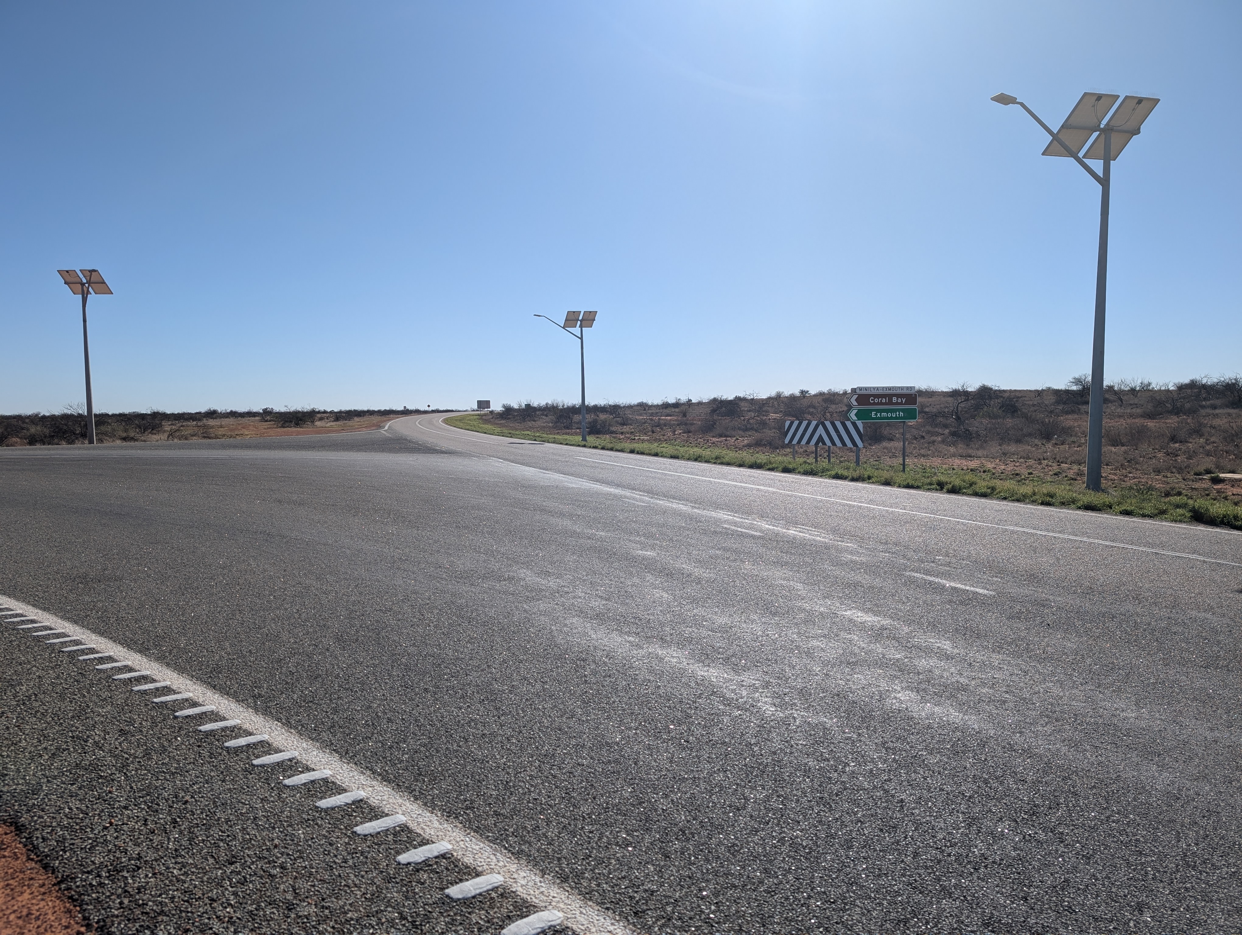 The turn-off to Exmouth (and Coral Bay) as pictured from the left side of the Australian National Highway.