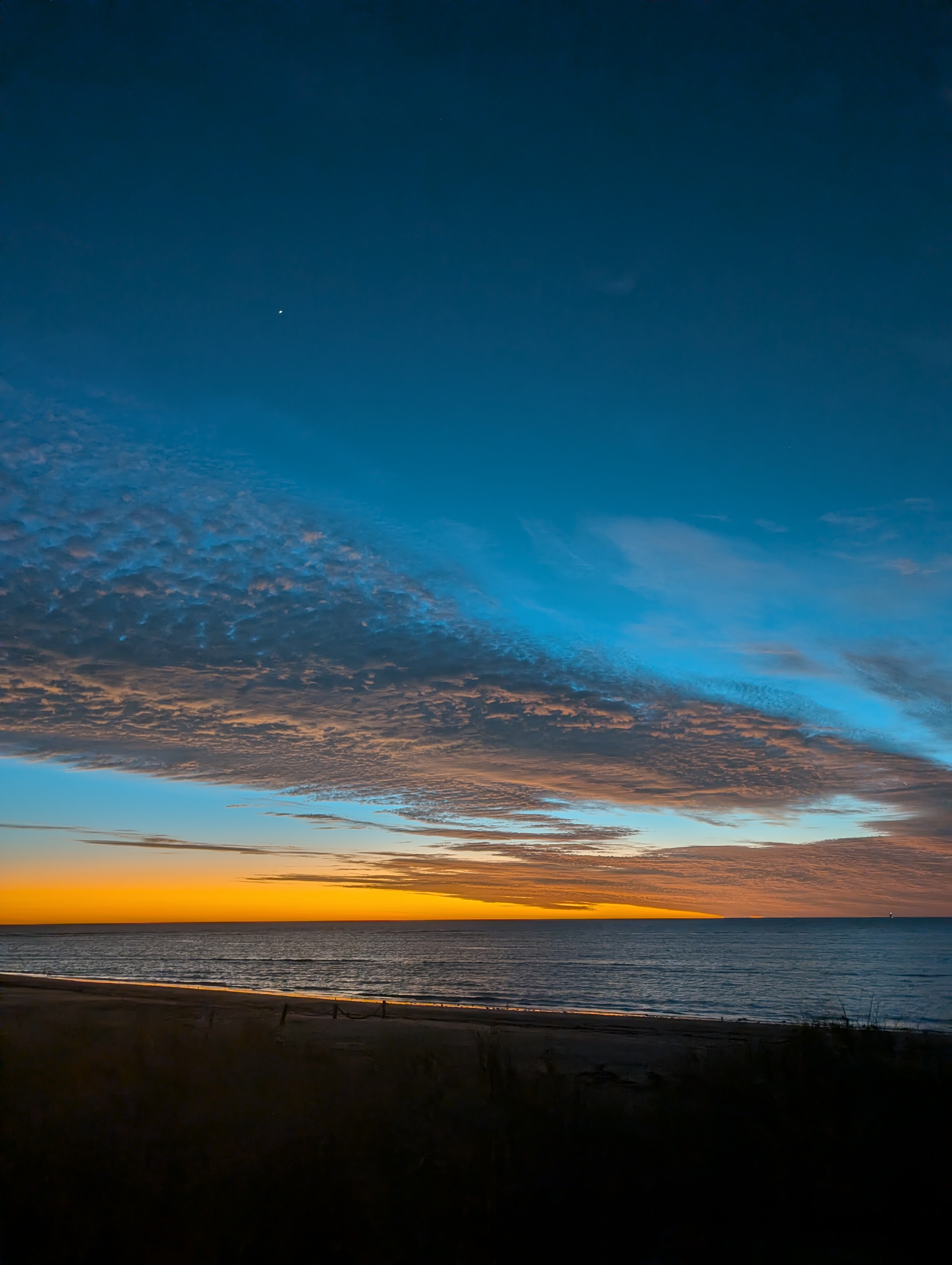Sunrise in Exmouth. I think the ISS is the bright dot in the sky.