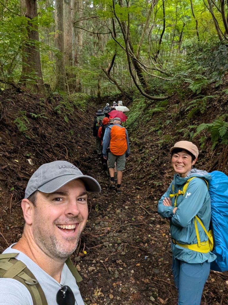 Joaby takes a selfie of his tour group. Local guide Miki-san stands in the foreground.